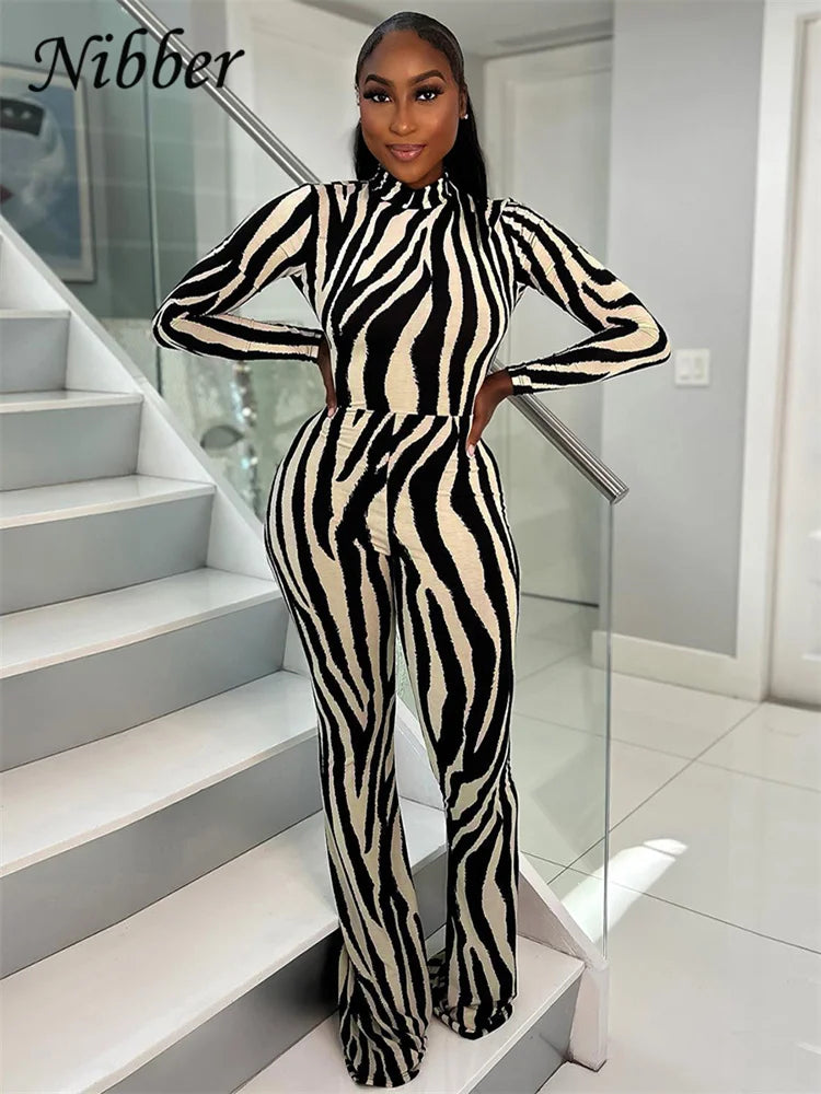 Zebra-stripe O-neck Backless Jumpsuits Women Patchwork Sexy Long Sleeve Skinny Overalls Flared Pants One Piece Clothing