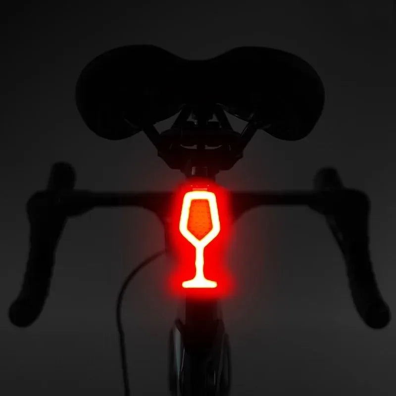 NEW Arrivals Wine Glass/Bone/ Steering 3 Styles Multi Lighting Modes Bicycle Tail Light Cycling Lamp USB Rechargeable Led Flash Tail Rear Lights MTB Seat Post Bike Accessories Sports Supplies