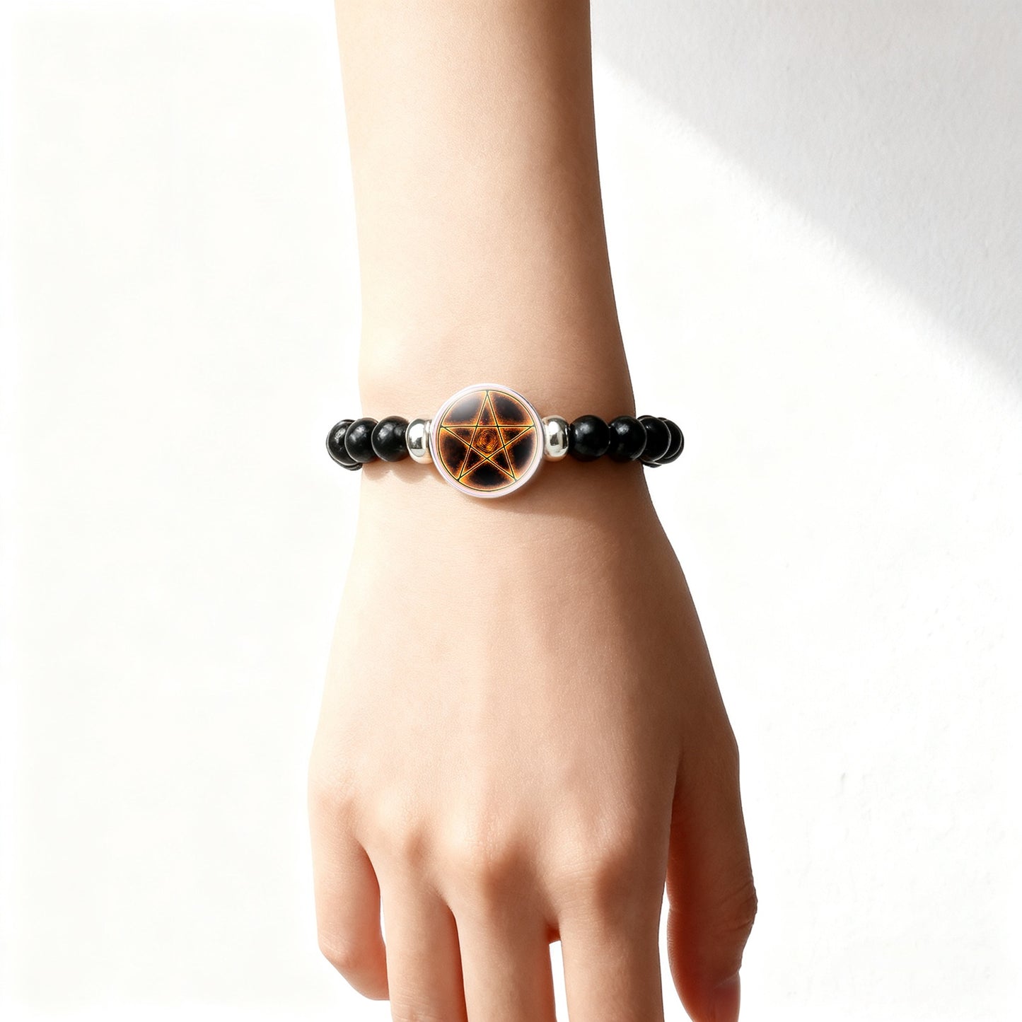 A Packaged Item (Teenager's Classic Style Black Plastic Bead And Chain Bracelet), Featuring a Unique Design with a Mysterious Pentagram Pattern Surrounded by Golden Light And Spiral Textures
