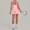 12 Colors S-XL Women's Professional Tennis Dress Cross Back U-Shape Backless Top Fluffy Pleated Skirt With Pocket Running Fitness Tennis Dress Women Sports Clothing Supplies