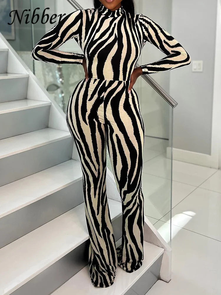 Zebra-stripe O-neck Backless Jumpsuits Women Patchwork Sexy Long Sleeve Skinny Overalls Flared Pants One Piece Clothing