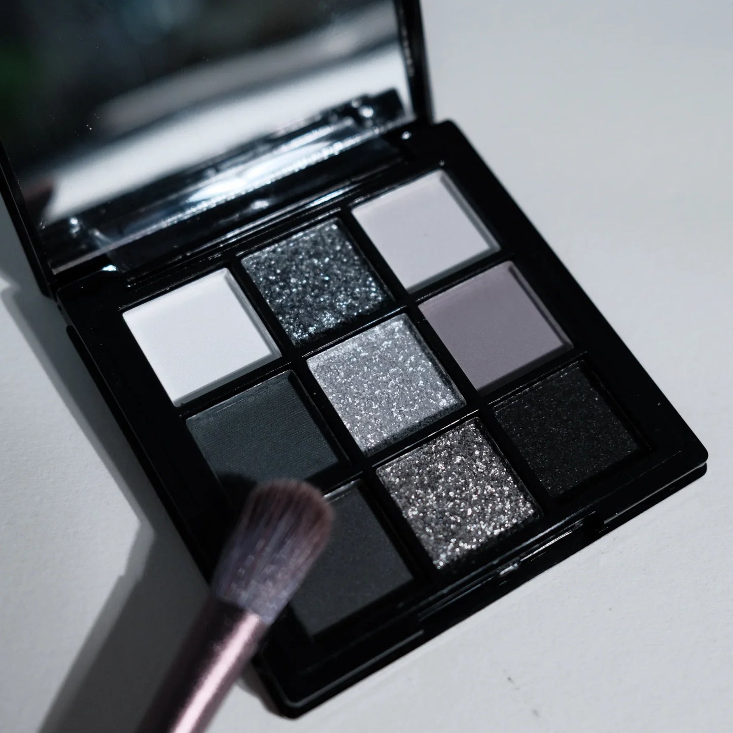 9-Shades Eyeshadow Palette: Black Swan, Smoky, Dark Black, Grey Silver Glitter, Matte Finish, Long-Lasting, and Easy to Color Women Cosmetic Supplies